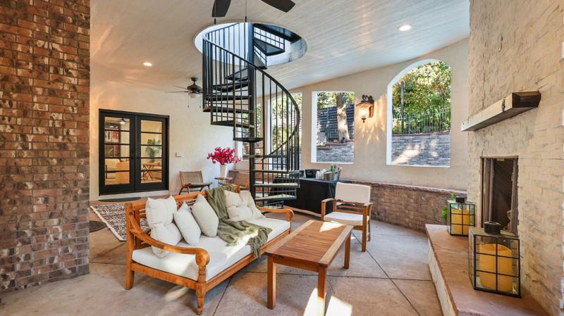 Living room with spiral staircase